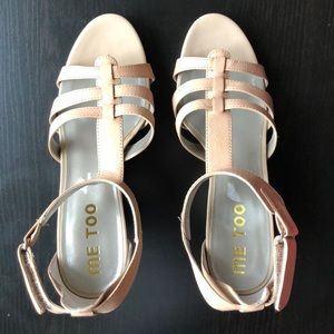 Blush colored ankle strap sandals.